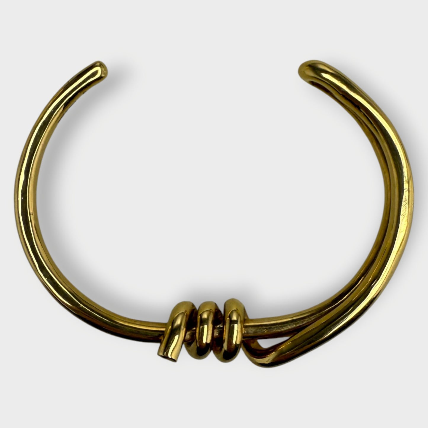 Gold Toned Metal Knot Cuff Bracelet