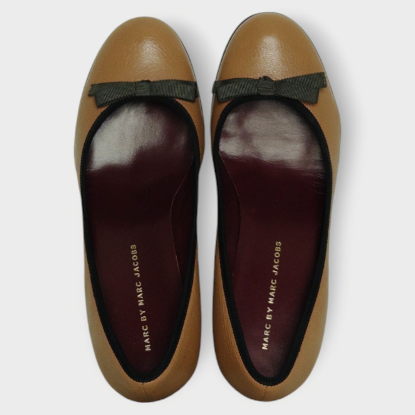 Bow Heeled Pumps