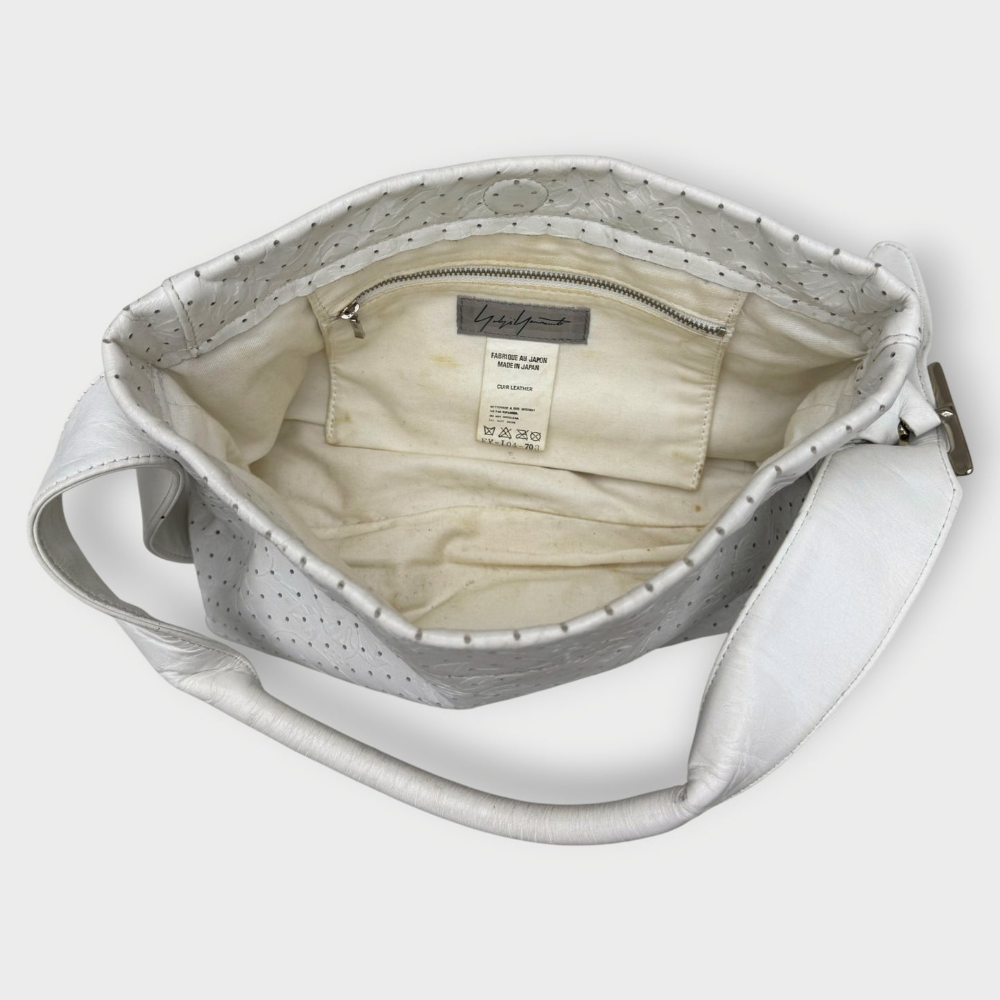 Perforation Floral Leather Shoulder Bag