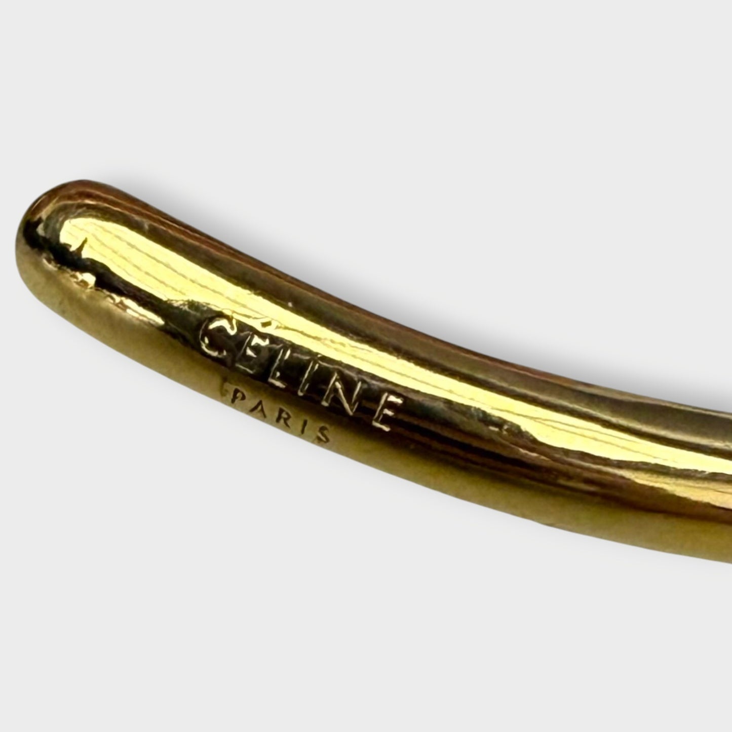 Gold Toned Metal Knot Cuff Bracelet